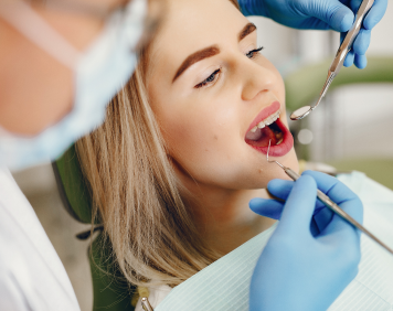 beautiful-girl-sitting-dentist-s-office 2