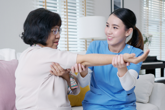 nurse-physiotherapy-worker-at-home-in-rehabilitati-2021-10-21-03-46-37-utc 1
